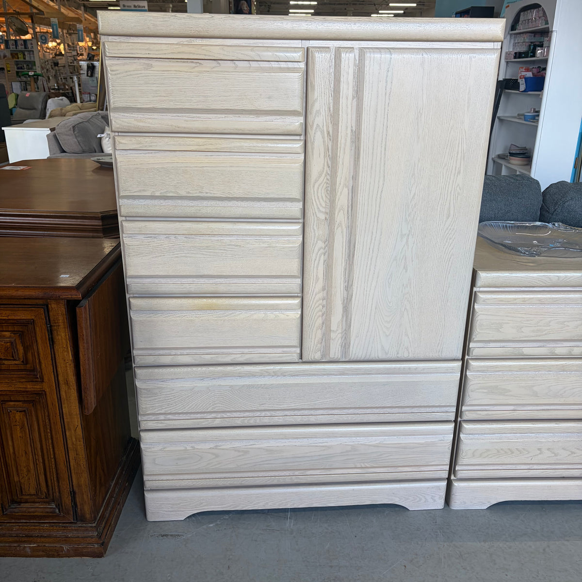 Spacious tall dresser with dedicated wardrobe compartment
