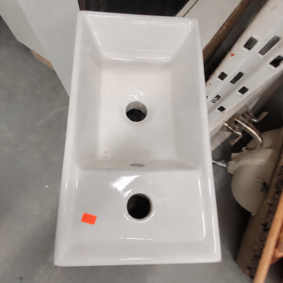 Compact Woodgrain Bathroom Vanity with White Sink