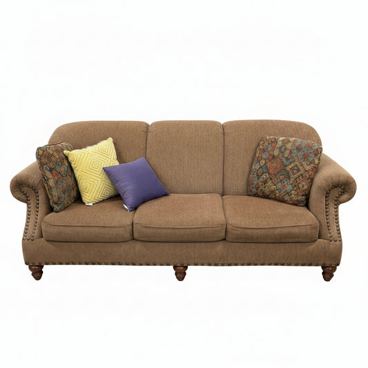 BROWN UPHOLSTERED COUCH