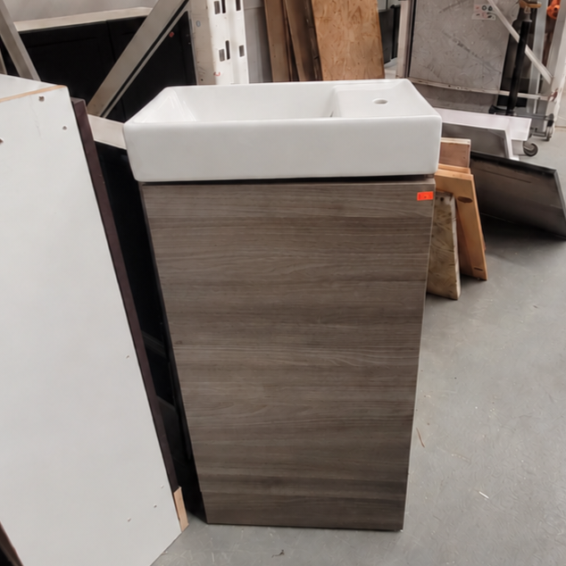 Compact Woodgrain Bathroom Vanity with White Sink